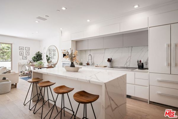 Interior, Kitchen, Marble Walls, Recessed Lighting, Stainless Steel Appliances, Wood Texture Flooring
