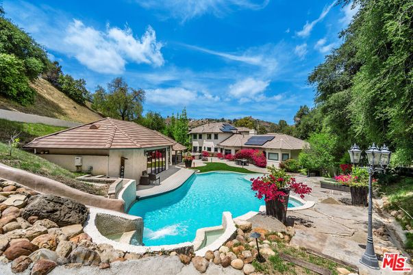 Exterior, Pool, Solar Panels