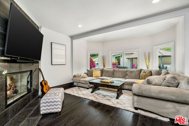 Fireplace, Interior, Living room, Recessed Lighting, Wood Texture Flooring