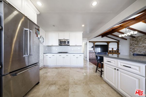 Interior, Kitchen, Pendant Lights, Recessed Lighting, Stainless Steel Appliances, Stone Walls, Wooden Beams