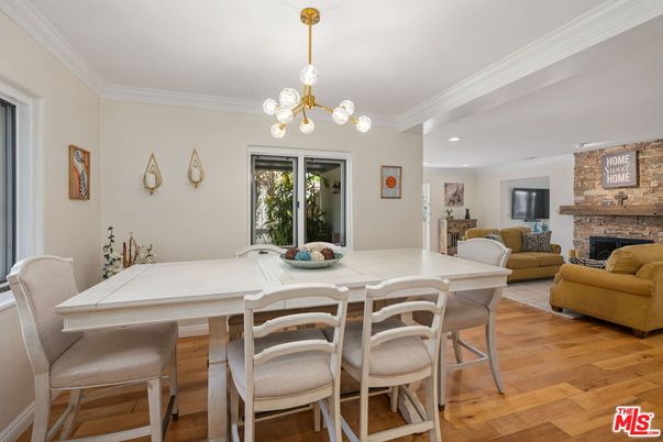 Dining room, Fireplace, Interior, Living room, Pendant Lights, Recessed Lighting, Stone Walls, Wood Texture Flooring