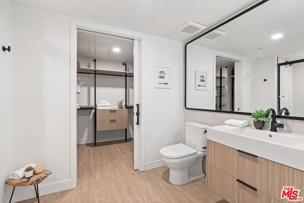 Bathroom, Dual Sink Vanities, Interior, Recessed Lighting, Wood Texture Flooring