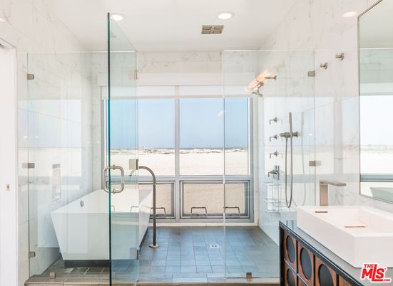 Bathroom, Dual Sink Vanities, Free Standing Baths, Glass Shower, Interior, Marble Walls, Recessed Lighting