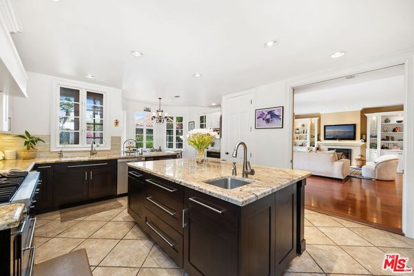Chandelier, Fireplace, Interior, Kitchen, Living room, Recessed Lighting, Wood Texture Flooring