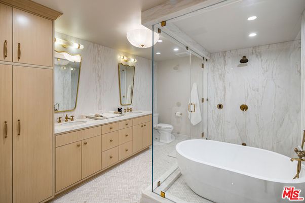 Bathroom, Dual Sink Vanities, Free Standing Baths, Glass Shower, Interior, Marble Walls, Recessed Lighting
