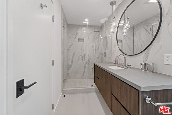 Bathroom, Dual Sink Vanities, Glass Shower, Interior, Marble Walls, Pendant Lights