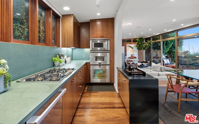 Dining room, Interior, Kitchen, Recessed Lighting, Stainless Steel Appliances, Wood Texture Flooring