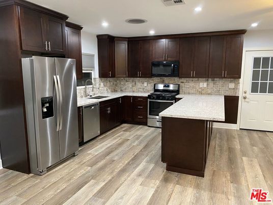 Interior, Kitchen, Recessed Lighting, Stainless Steel Appliances, Wood Texture Flooring