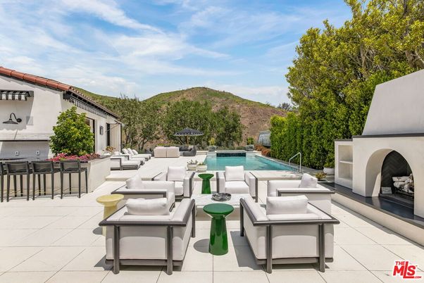 Exterior, Fireplace, Pool