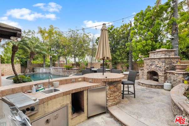 Exterior, Fireplace, Pool
