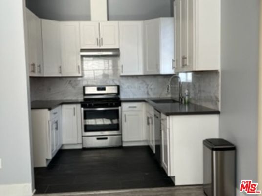 Interior, Kitchen, Marble Walls, Stainless Steel Appliances, Wood Texture Flooring