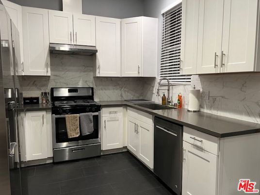 Interior, Kitchen, Marble Walls, Stainless Steel Appliances