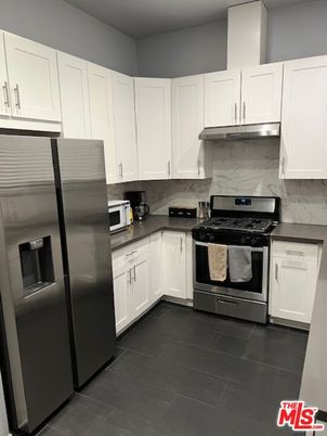 Interior, Kitchen, Marble Walls, Stainless Steel Appliances