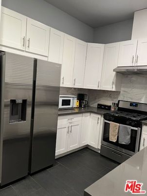 Interior, Kitchen, Marble Walls, Stainless Steel Appliances