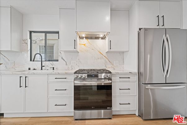 Interior, Kitchen, Marble Walls, Stainless Steel Appliances, Wood Texture Flooring