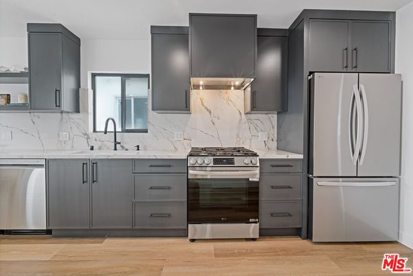 Interior, Kitchen, Marble Walls, Stainless Steel Appliances, Wood Texture Flooring