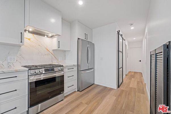 Interior, Kitchen, Recessed Lighting, Stainless Steel Appliances, Wood Texture Flooring