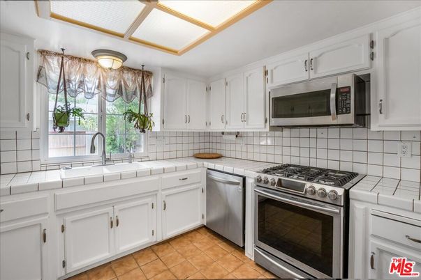 Interior, Kitchen, Stainless Steel Appliances, Tile Countertops
