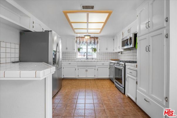 Interior, Kitchen, Stainless Steel Appliances, Tile Countertops