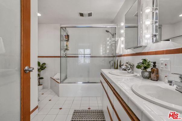 Bathroom, Dual Sink Vanities, Glass Shower, Interior, Recessed Lighting, Tile Countertops