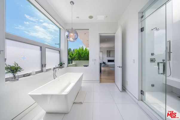 Bathroom, Free Standing Baths, Glass Shower, Interior, Pendant Lights, Recessed Lighting, Wood Texture Flooring