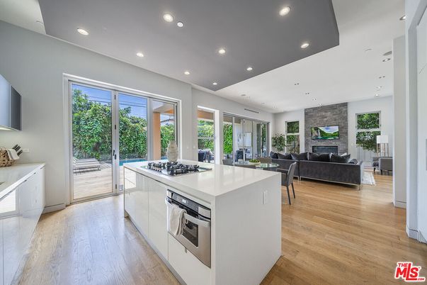 Dining room, Interior, Kitchen, Living room, Recessed Lighting, Stainless Steel Appliances, Wood Texture Flooring