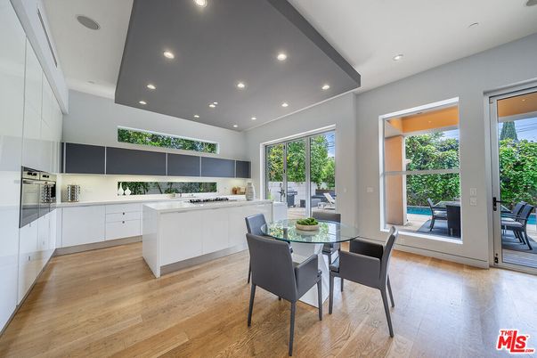 Dining room, Interior, Kitchen, Recessed Lighting, Stainless Steel Appliances, Wood Texture Flooring