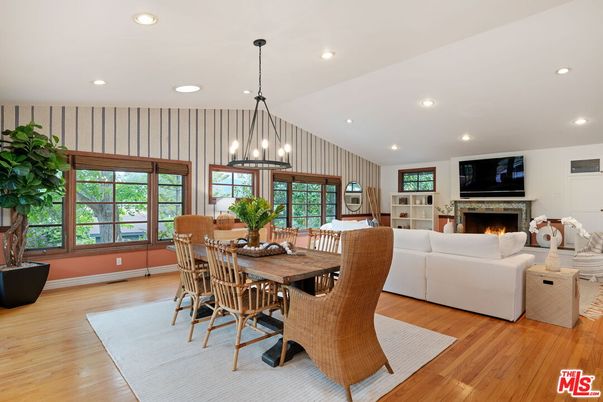 Dining room, Fireplace, Interior, Living room, Pendant Lights, Recessed Lighting, Wood Texture Flooring