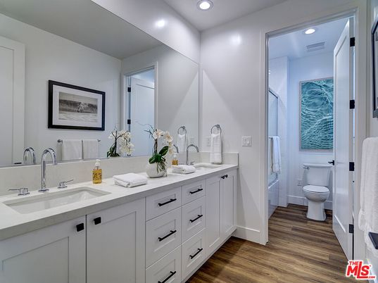 Bathroom, Dual Sink Vanities, Interior, Recessed Lighting, Wood Texture Flooring