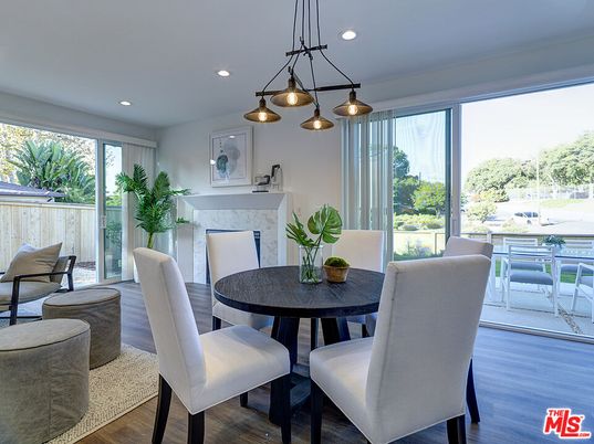 Dining room, Fireplace, Interior, Pendant Lights, Recessed Lighting, Wood Texture Flooring