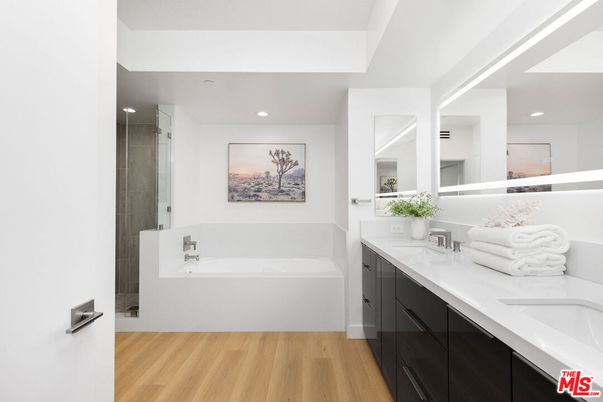 Bathroom, Dual Sink Vanities, Interior, Recessed Lighting, Wood Texture Flooring