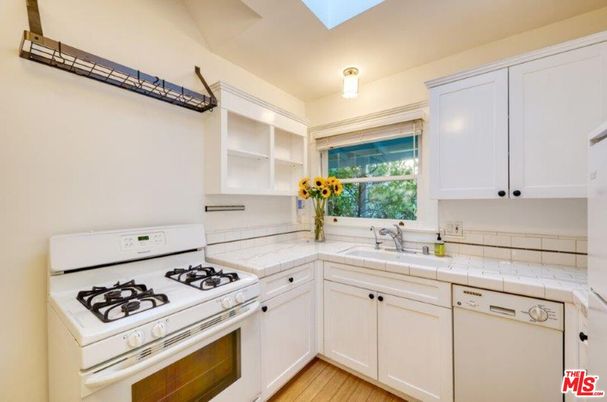 Interior, Kitchen, Tile Countertops, Wood Texture Flooring