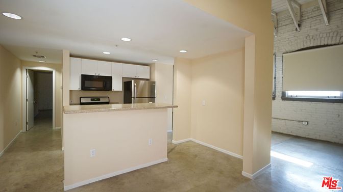 Interior, Kitchen, Recessed Lighting, Stainless Steel Appliances, Stone Walls