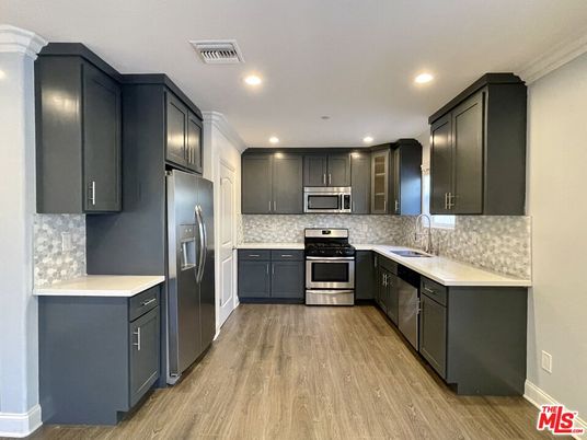 Interior, Kitchen, Recessed Lighting, Stainless Steel Appliances, Wood Texture Flooring