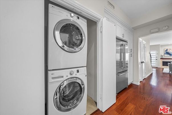 Fireplace, Interior, Utility Closets, Washer, Wood Texture Flooring