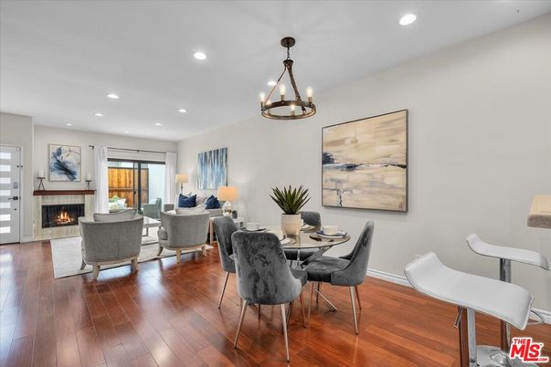 Dining room, Fireplace, Interior, Living room, Pendant Lights, Recessed Lighting, Wood Texture Flooring