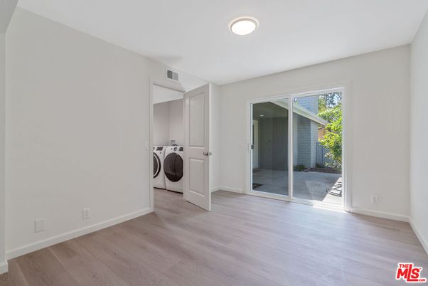 Empty room, Interior, Utility Closets, Washer, Wood Texture Flooring