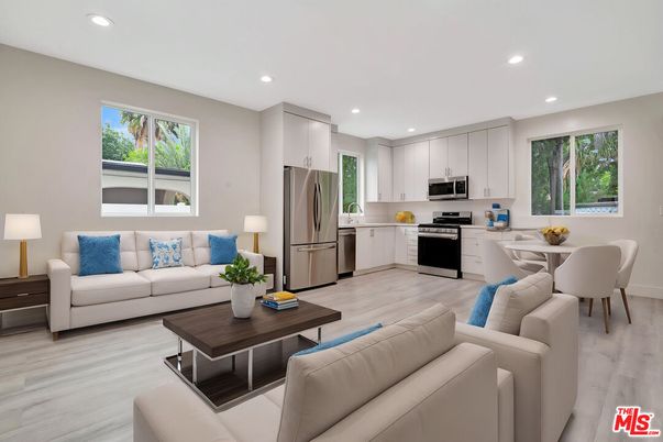 Dining room, Interior, Kitchen, Living room, Recessed Lighting, Stainless Steel Appliances, Wood Texture Flooring