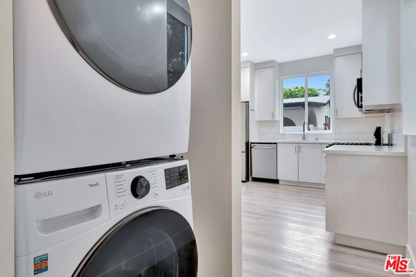 Interior, Kitchen, Recessed Lighting, Utility Closets, Washer, Wood Texture Flooring