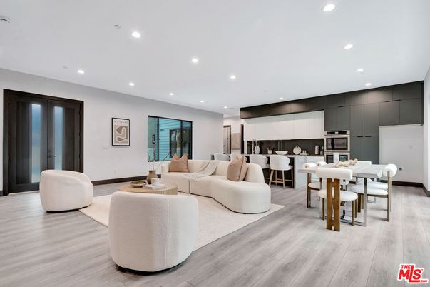 Dining room, Interior, Kitchen, Living room, Recessed Lighting, Stainless Steel Appliances, Wood Texture Flooring