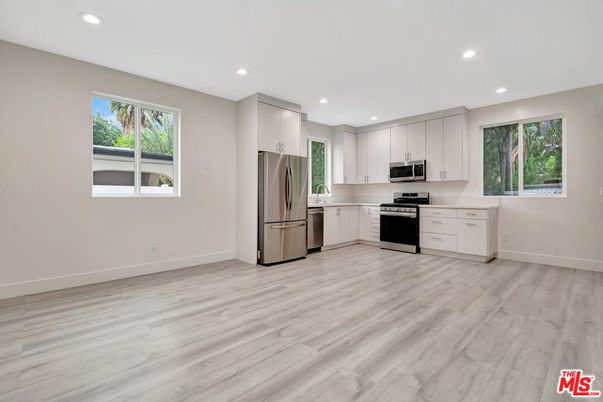 Interior, Kitchen, Recessed Lighting, Stainless Steel Appliances, Wood Texture Flooring