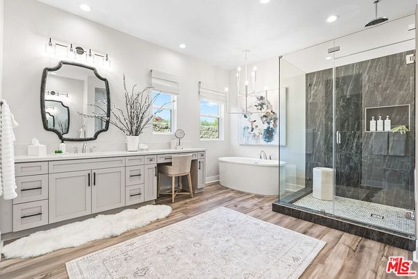 Bathroom, Dual Sink Vanities, Free Standing Baths, Glass Shower, Interior, Pendant Lights, Recessed Lighting, Wood Texture Flooring