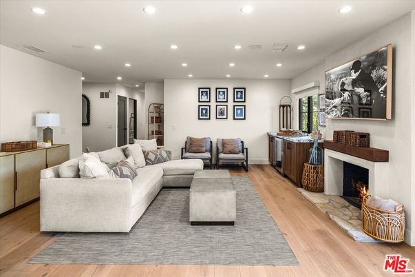 Fireplace, Interior, Living room, Recessed Lighting, Wood Texture Flooring