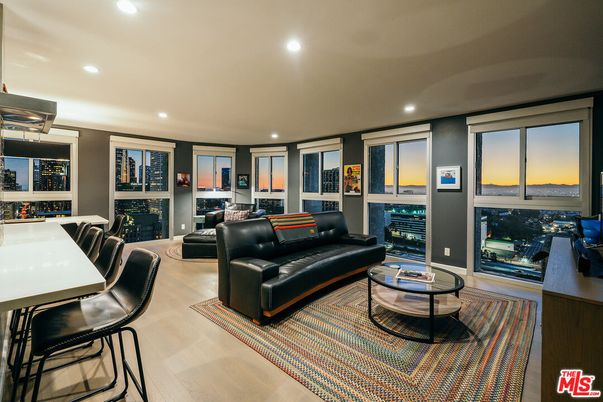 Dining room, Fireplace, Interior, Living room, Recessed Lighting, Wood Texture Flooring