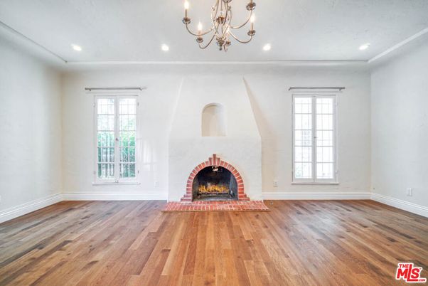 Chandelier, Empty room, Fireplace, Interior, Recessed Lighting, Wood Texture Flooring