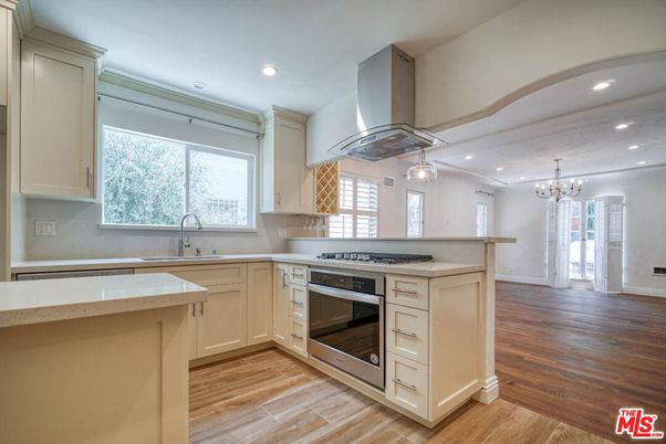 Chandelier, Interior, Kitchen, Recessed Lighting, Stainless Steel Appliances, Wood Texture Flooring