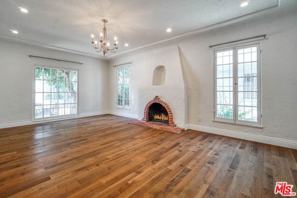 Chandelier, Empty room, Fireplace, Interior, Recessed Lighting, Wood Texture Flooring