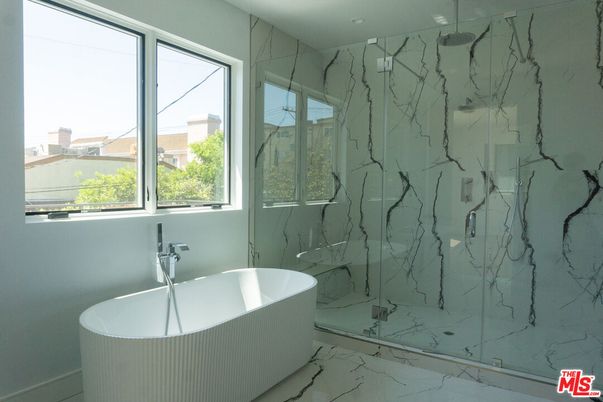 Bathroom, Free Standing Baths, Glass Shower, Interior, Marble, Marble Walls, Recessed Lighting
