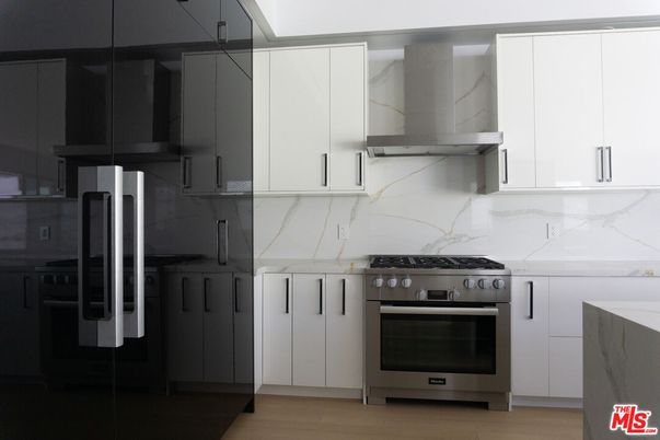 Interior, Kitchen, Marble Walls, Stainless Steel Appliances, Wood Texture Flooring