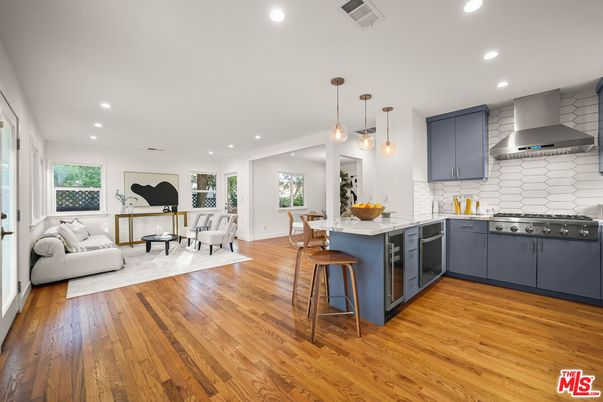 Dining room, Interior, Kitchen, Living room, Pendant Lights, Recessed Lighting, Stainless Steel Appliances, Wood Texture Flooring